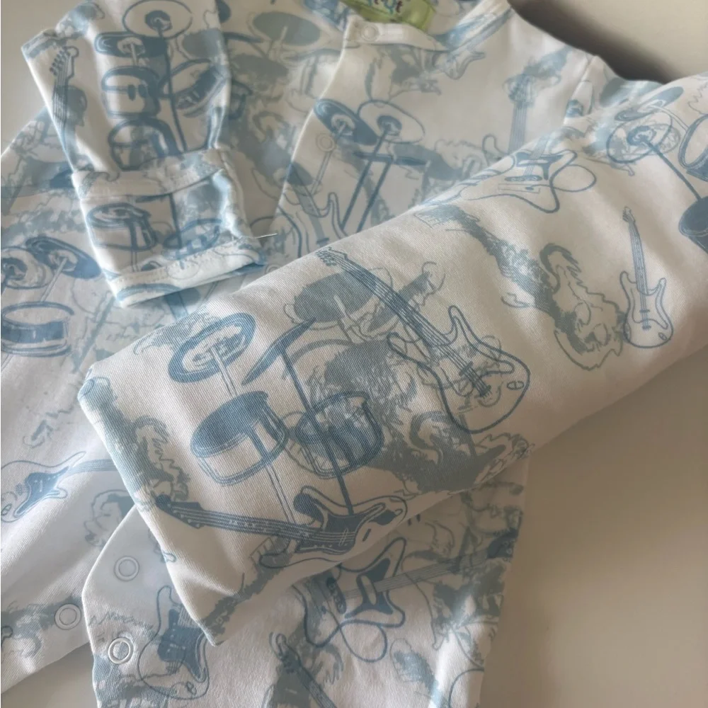 Kissy Kissy White One-Piece with Light Blue Music Print